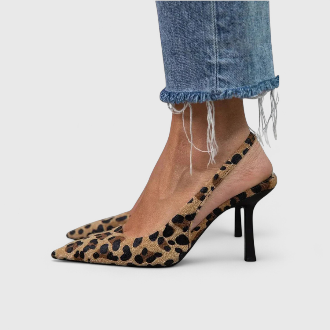 side view of leopard print slingback heels with black stiletto heel