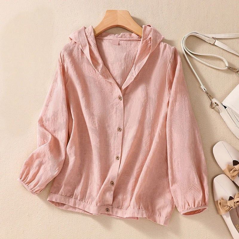 pink relaxed hooded shirt with wooden buttons and elastic sleeve cuffs