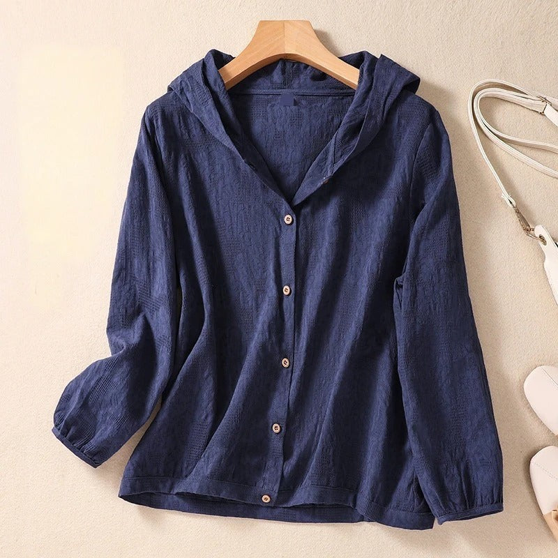 navy blue hooded button-down shirt with textured cotton fabric