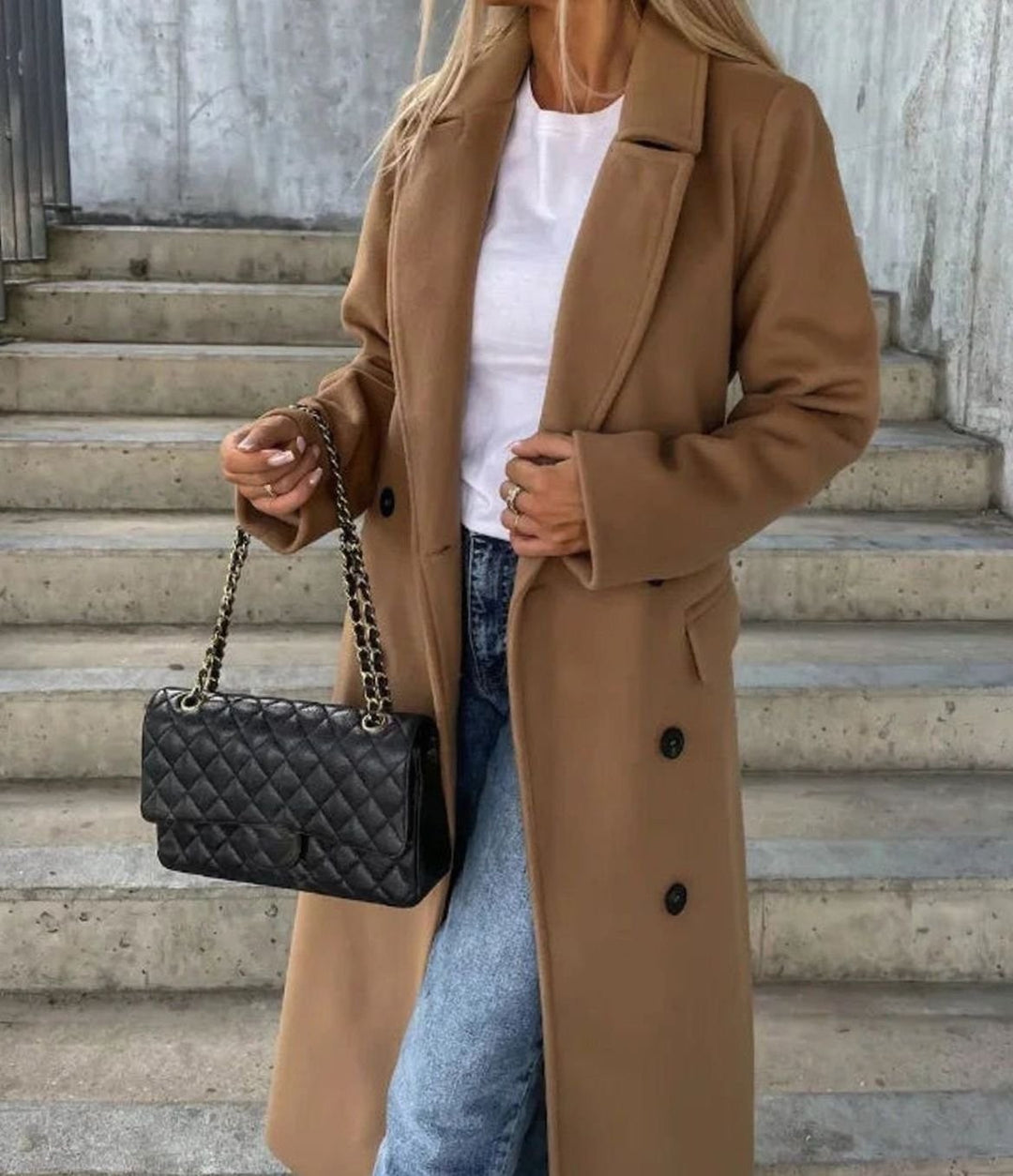 Camel double-breasted wool coat with tailored lapel and button fastening