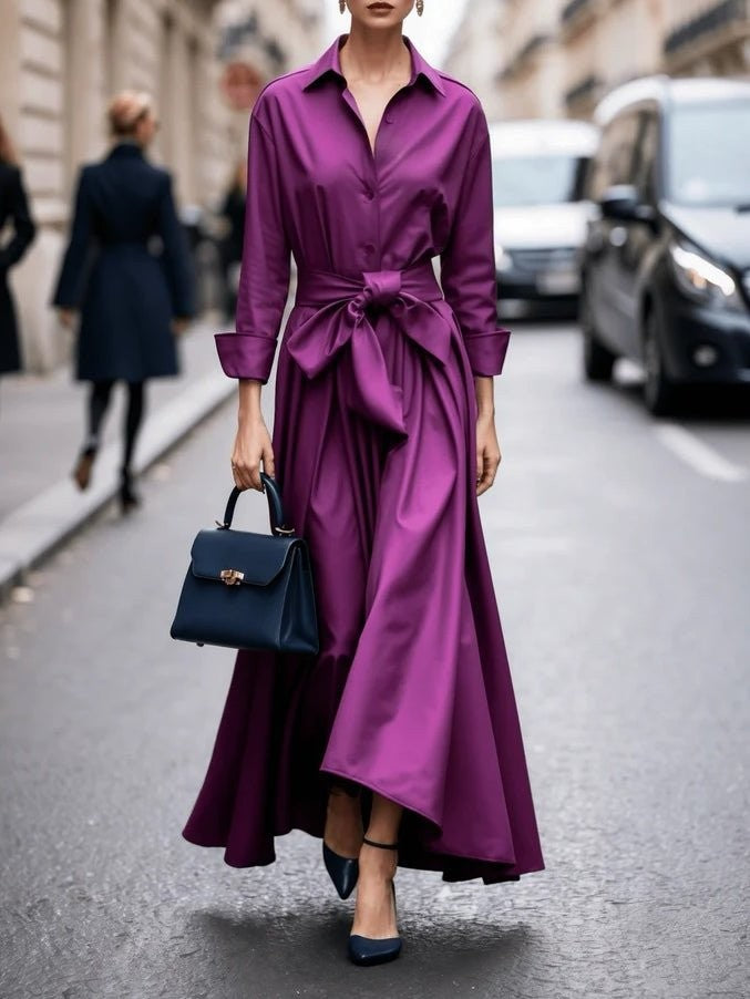 Magenta collared maxi dress with tie-waist belt and flowing pleated skirt