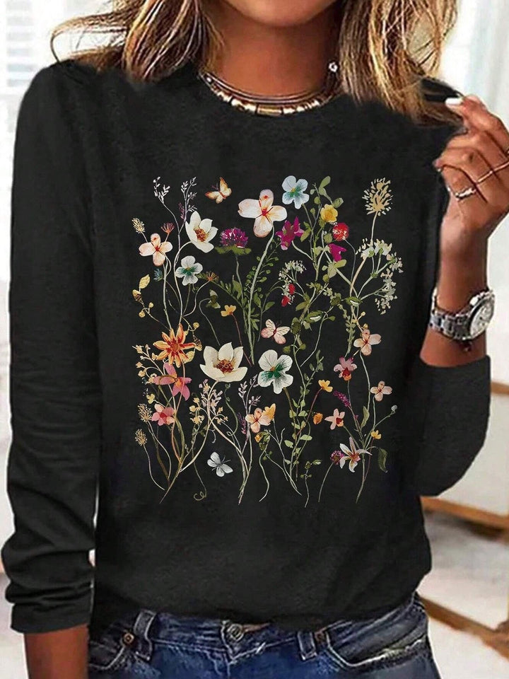 black crew-neck top with wildflower and botanical print design