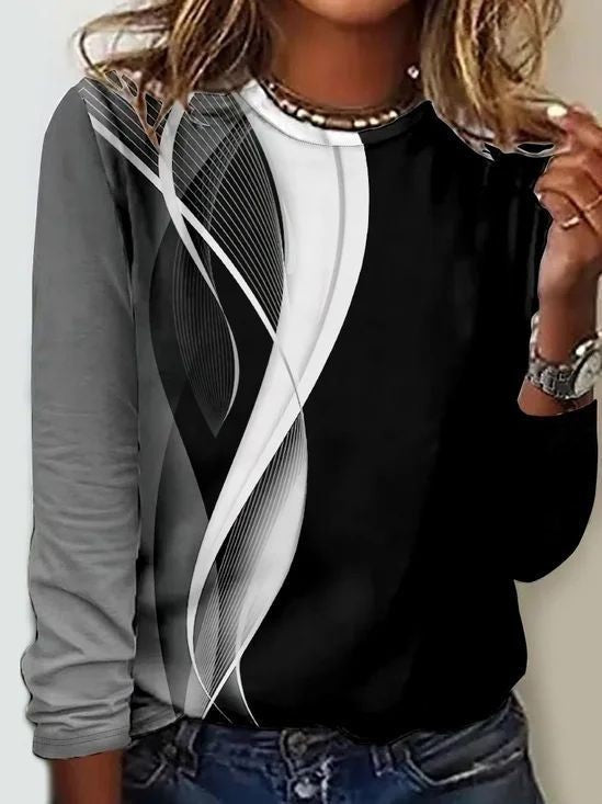 black and gray long-sleeve top with abstract swirl graphic print
