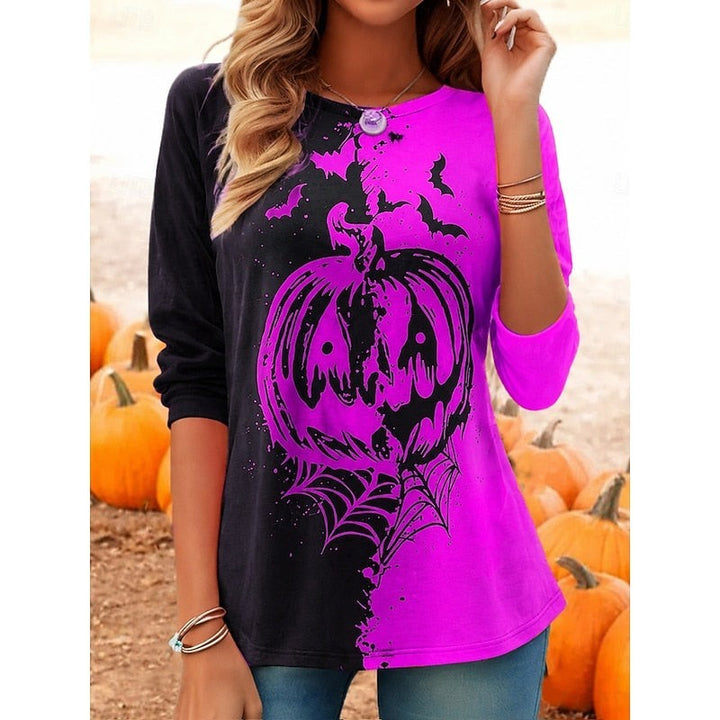 Pink and black long-sleeve top with graphic pumpkin and spiderweb print