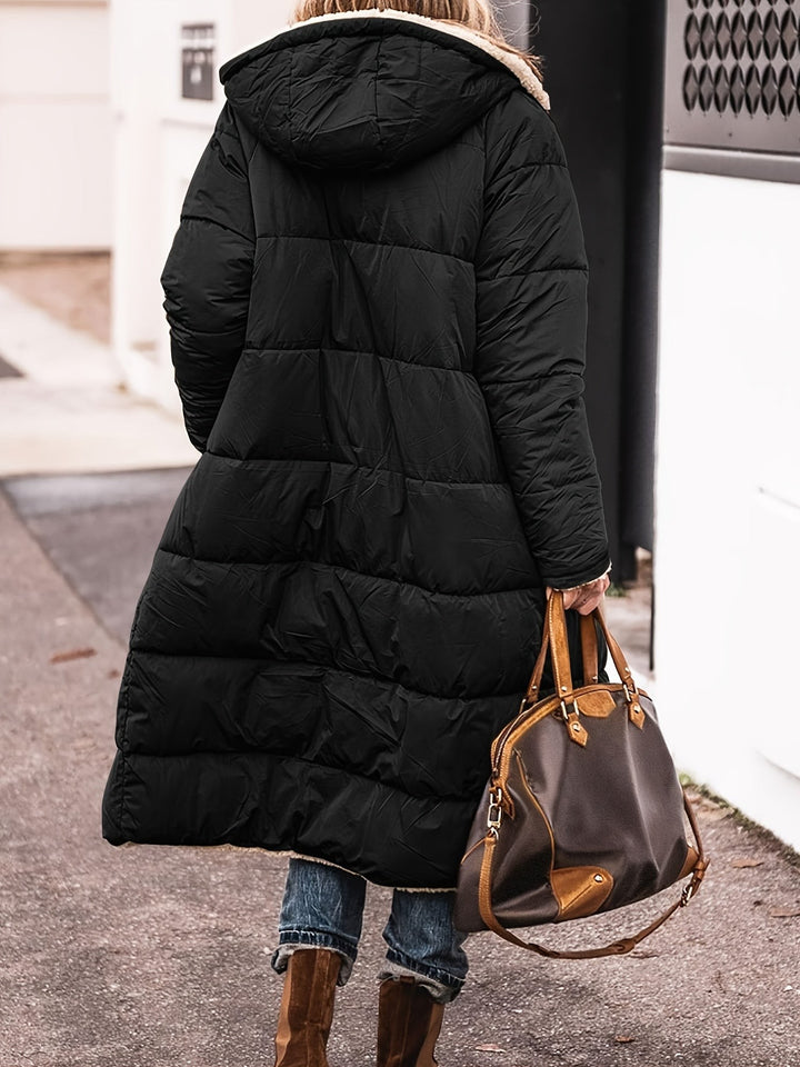 Back view of black long puffer coat with sherpa-lined hood and quilting