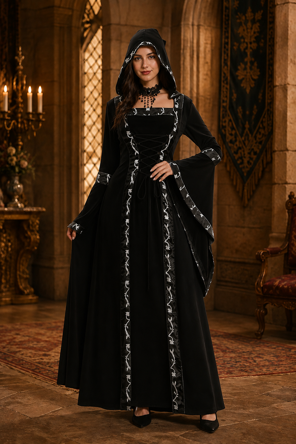 black hooded medieval gown with embroidered trim and bell sleeves