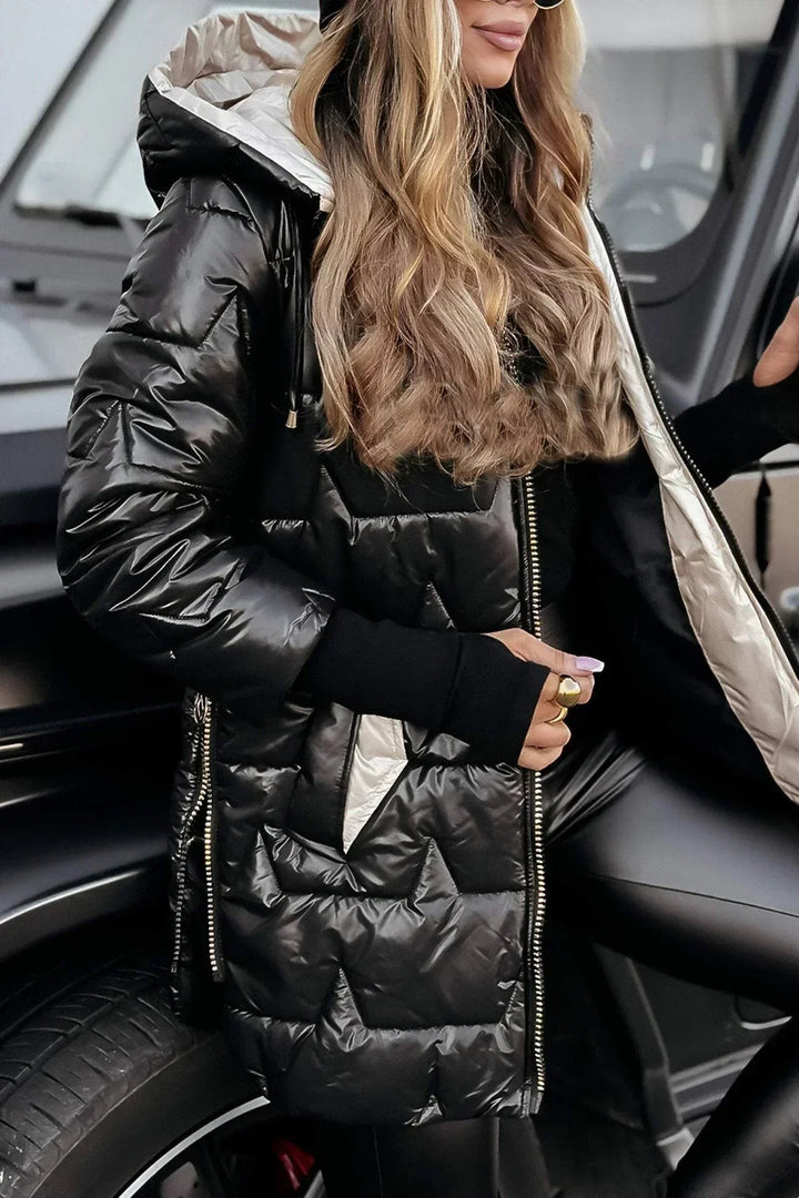 black high-shine puffer coat with contrast beige hood lining, hood up