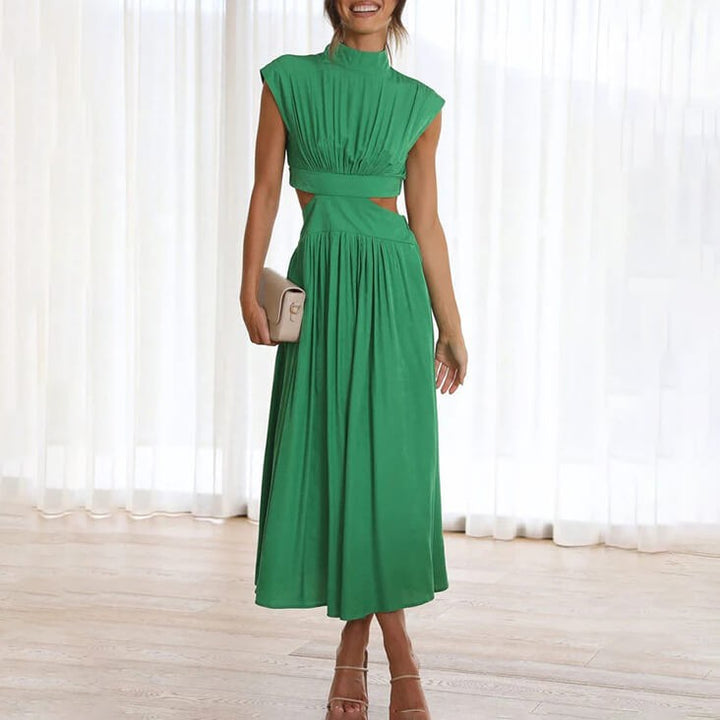 Green cutout maxi dress with mock neck and pleated flowy skirt