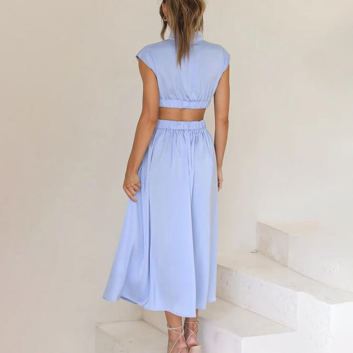 Back view of light blue cutout maxi dress with cropped top style