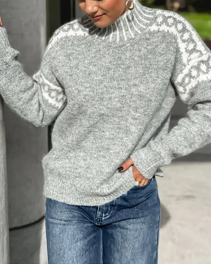 gray fair isle style sweater with mock neck and ribbed cuffs