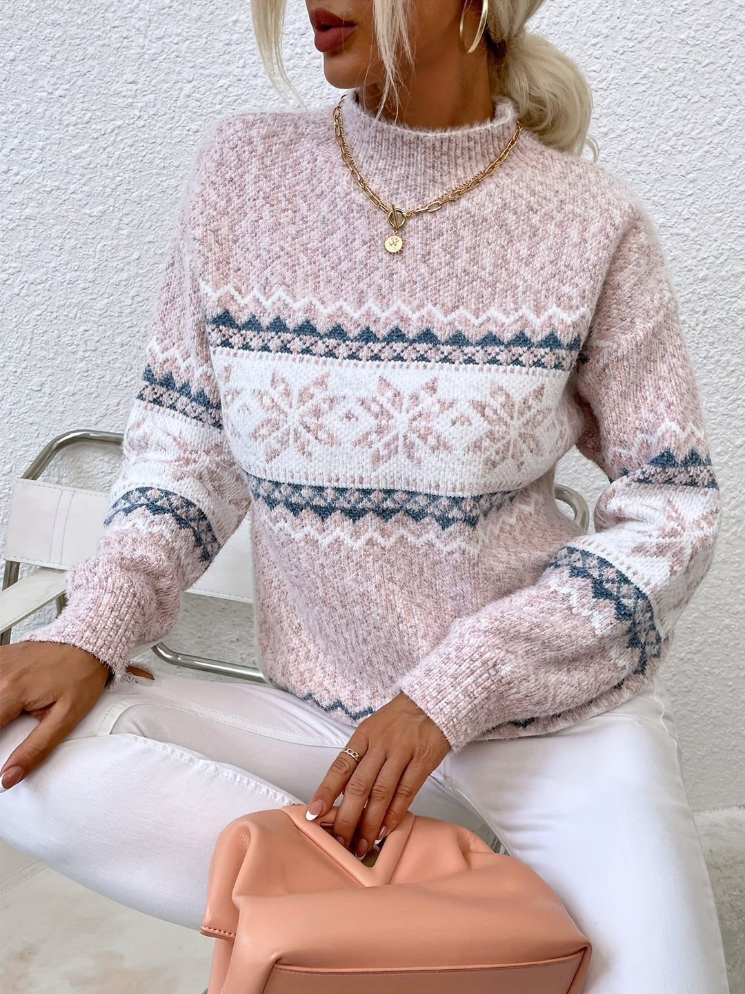 Light blue mock-neck jumper featuring textured fair isle snowflake design