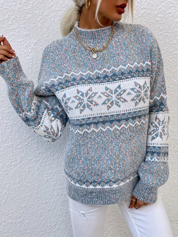 Blue marled snowflake jumper styled with white jeans and gold jewellery