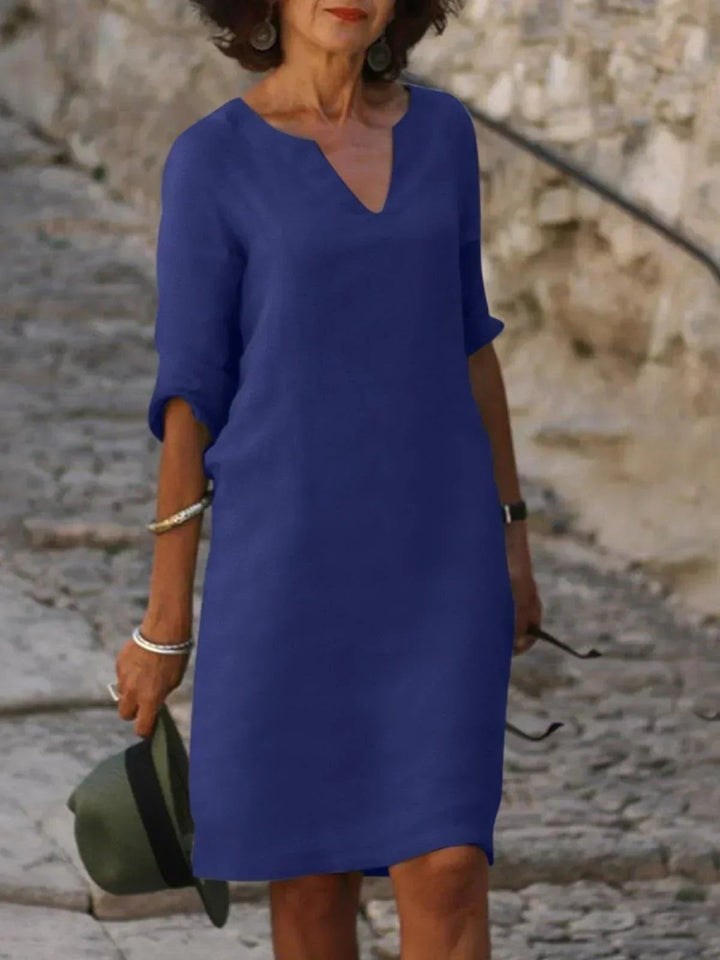 Royal blue notch V-neck shift dress with three-quarter sleeves