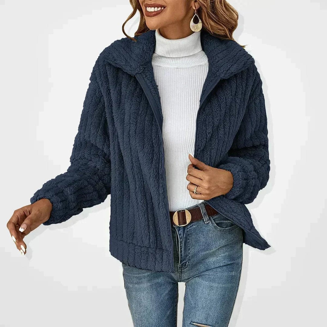 Navy ribbed fleece zip-up jacket with wide collar and oversized sleeves