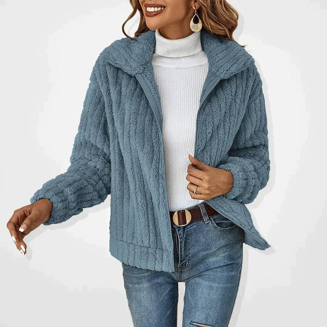 Dusky blue textured fleece jacket with zip fastening and turn-down collar