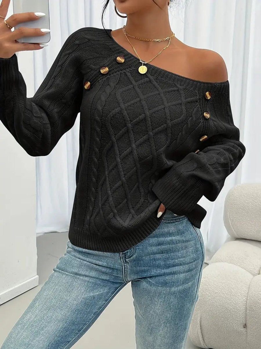Black cable knit jumper styled with asymmetric off-shoulder neckline and buttons