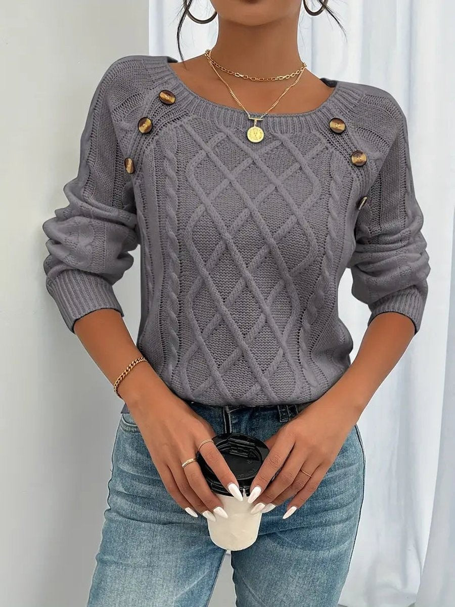 Grey cable knit jumper with button-detailed shoulder and ribbed cuffs