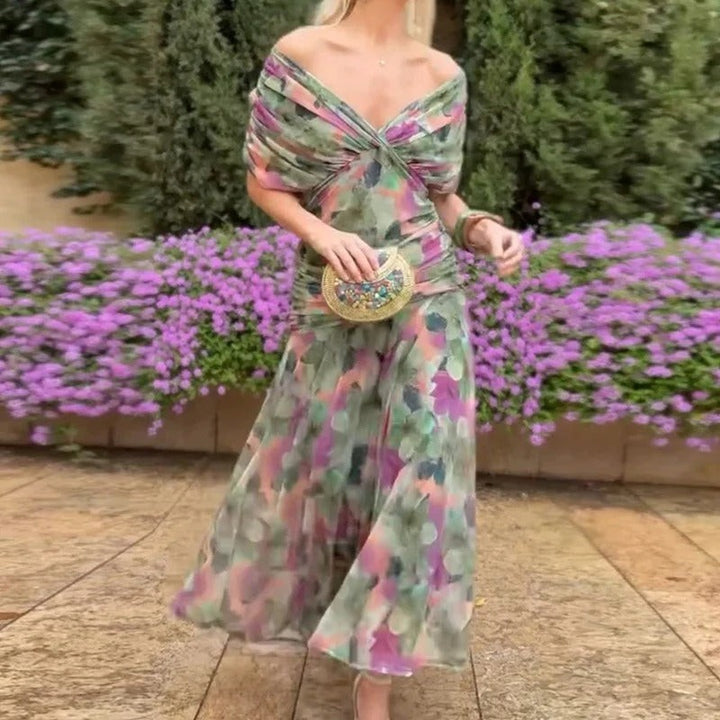 green floral off-shoulder midi dress with ruched twist front and flowy skirt