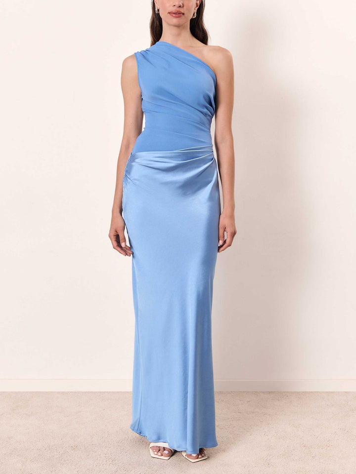 Front view of light blue one-shoulder gown with satin ruched skirt