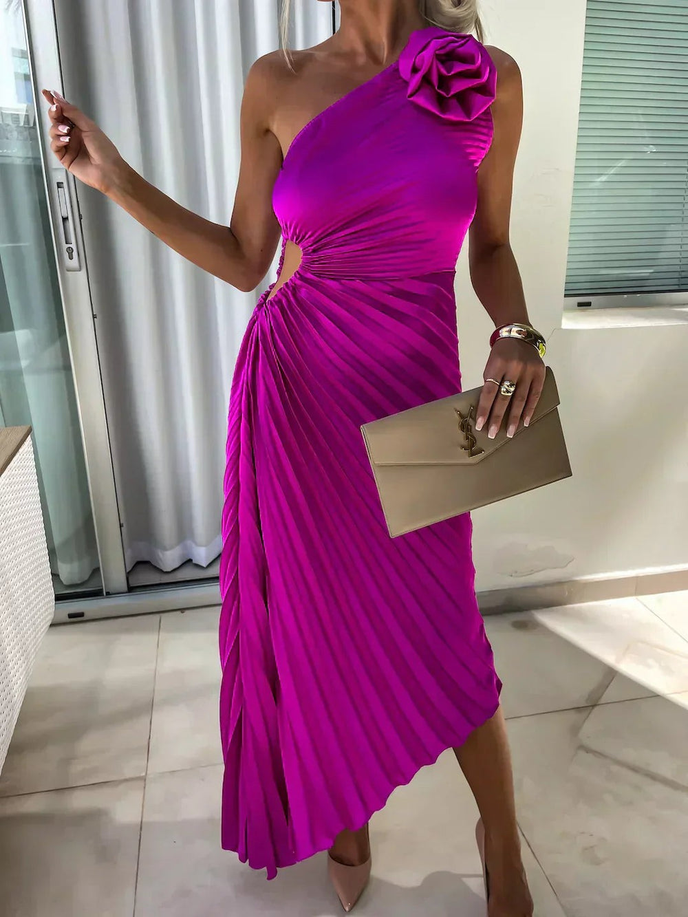 Magenta pleated satin dress featuring cutout waist and rose accent