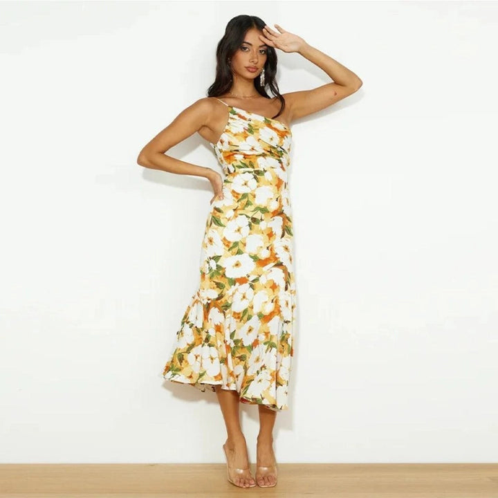 white and orange floral spaghetti strap midi dress with ruffle hem