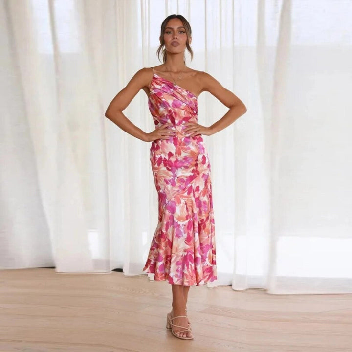 pink floral one-shoulder satin dress with flowing midi skirt