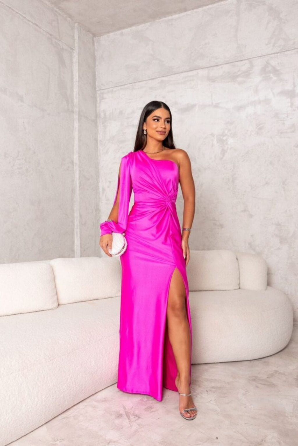 hot pink satin one-shoulder evening dress with draped sleeve and slit