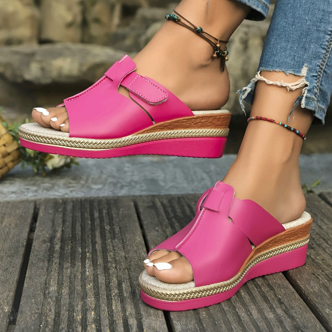Hot pink open-toe wedge sandals with espadrille platform and touch-strap detail