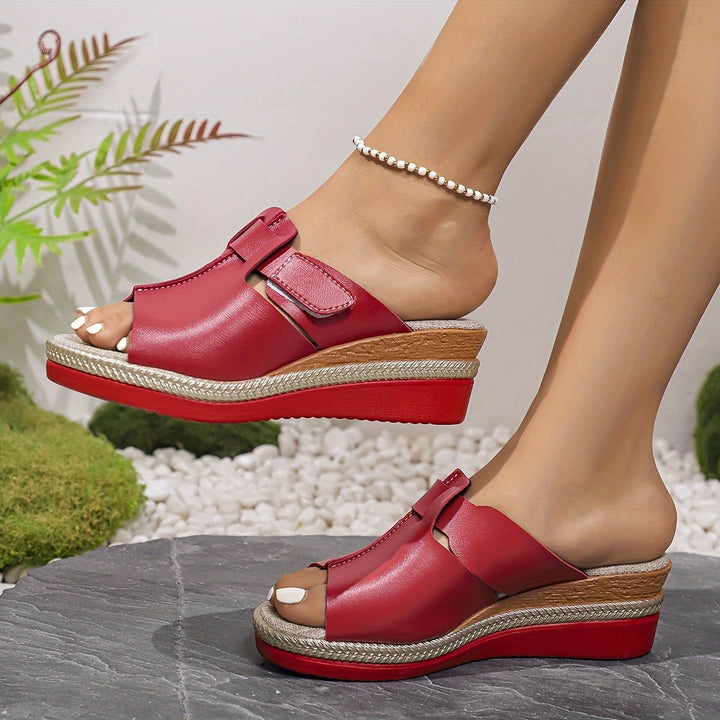 Red wedge sandals featuring espadrille platform and cutout strap design