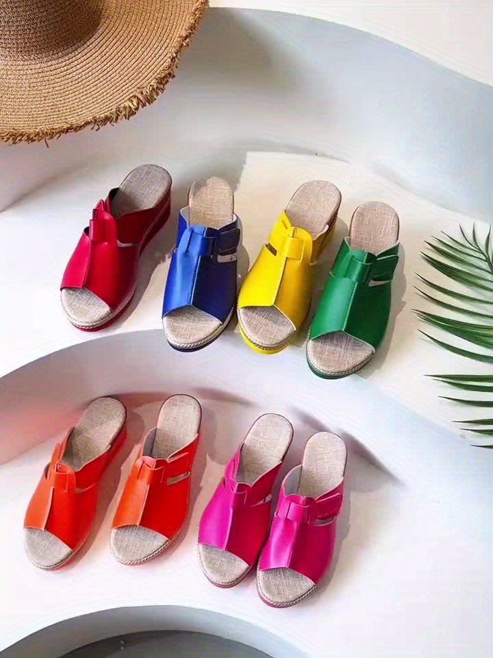 Multicolor peep-toe wedge sandals lined up showing espadrille platform styles