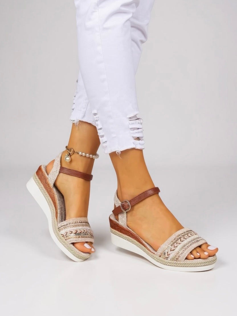 Ankle-strap wedge sandals featuring embroidered straps and jute-wrapped sole