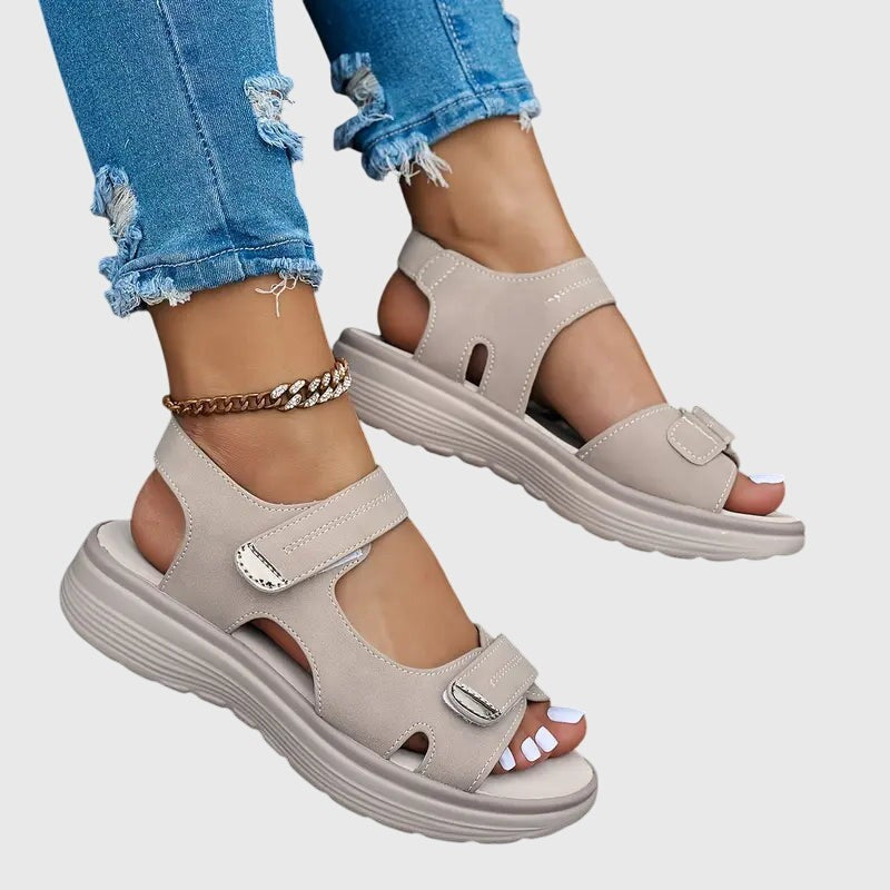 Taupe sandals with dual Velcro straps and cushioned platform sole