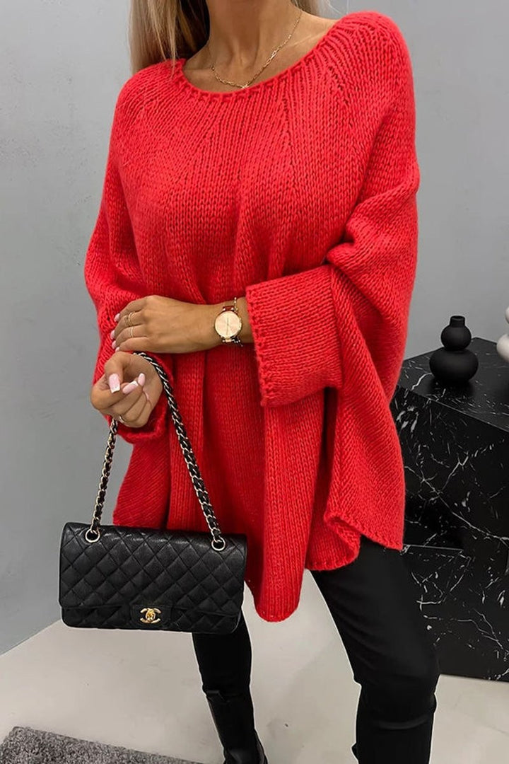 red chunky knit sweater with oversized batwing sleeves and ribbed crewneck detailing