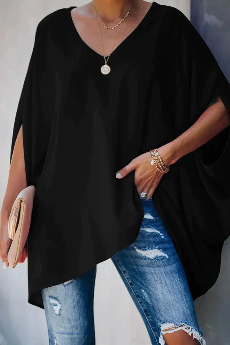 Black oversized V-neck tunic top with dramatic batwing sleeves and slit cuffs
