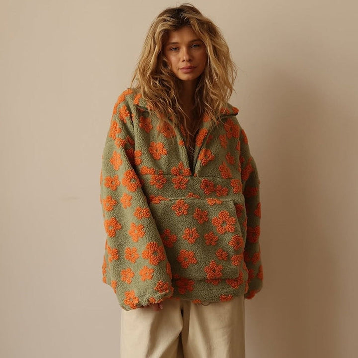 Khaki sherpa fleece half-zip jumper with bold orange floral print