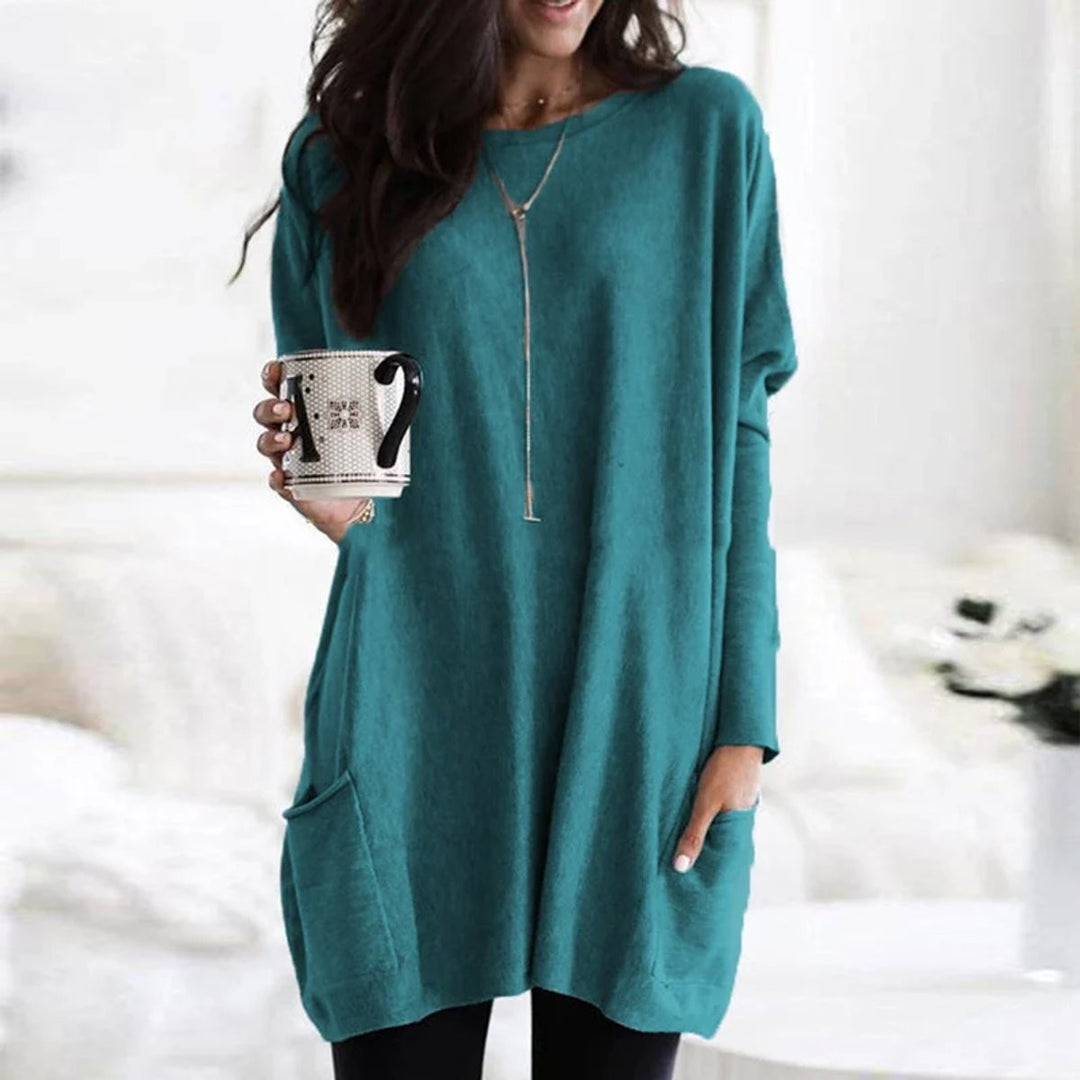 Teal green oversized tunic top with long sleeves and front pocket