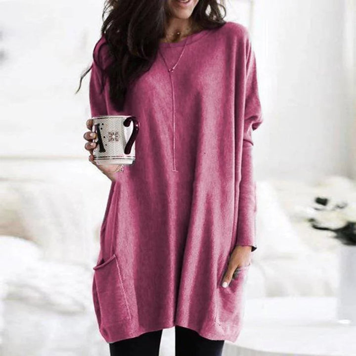 Rose pink long-sleeve tunic top featuring an oversized relaxed silhouette