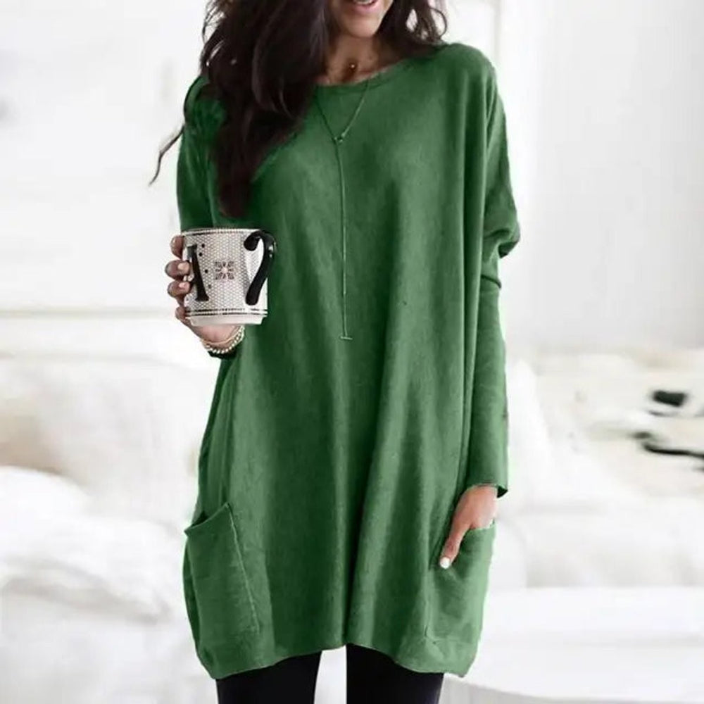 Green oversized long-sleeve pocket tunic top with relaxed batwing fit