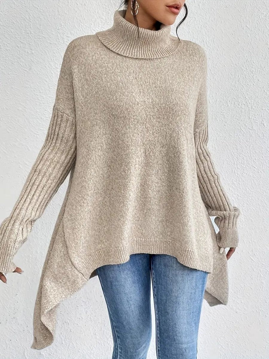 Beige oversized turtleneck sweater paired with skinny jeans, close-up front view