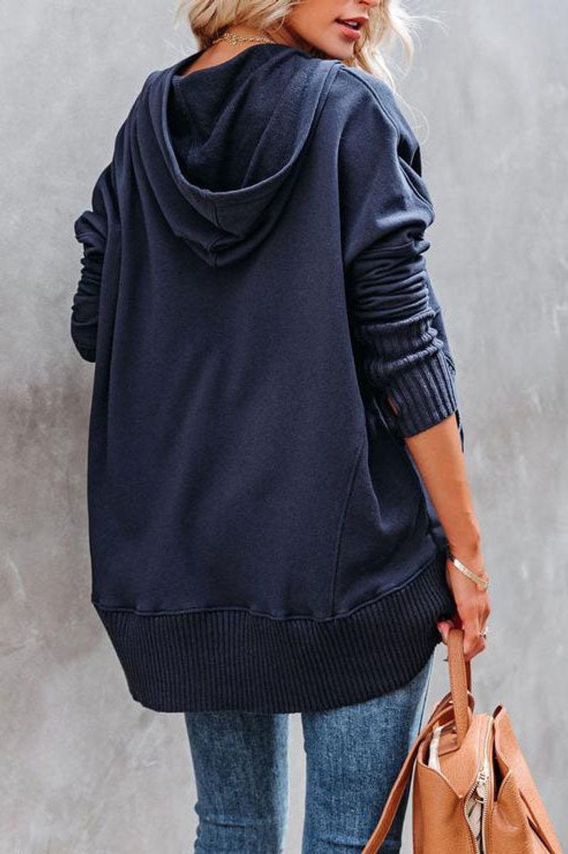 Back view of navy hooded tunic sweatshirt with ribbed trim