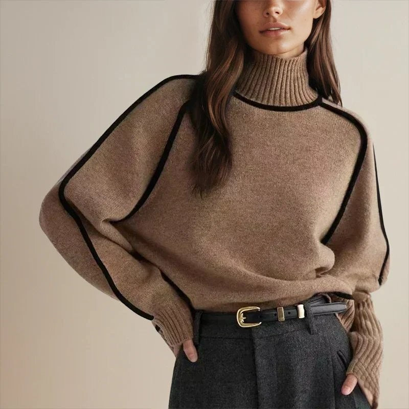 camel oversized turtleneck sweater with black contrast trim and belt
