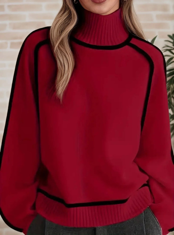 burgundy oversized turtleneck sweater with black piping seam detail