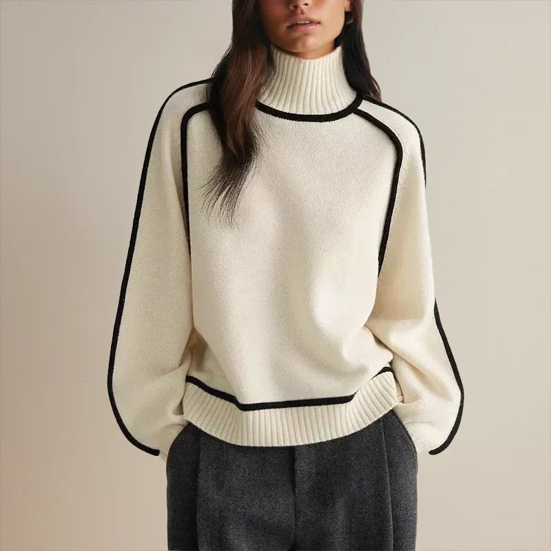 ivory oversized turtleneck sweater with black contrast piping detail