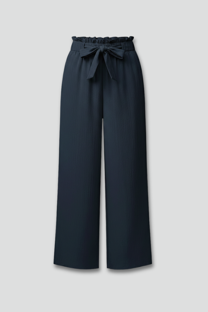 Navy paperbag-waist palazzo trousers with tie belt and wide legs, flat lay view