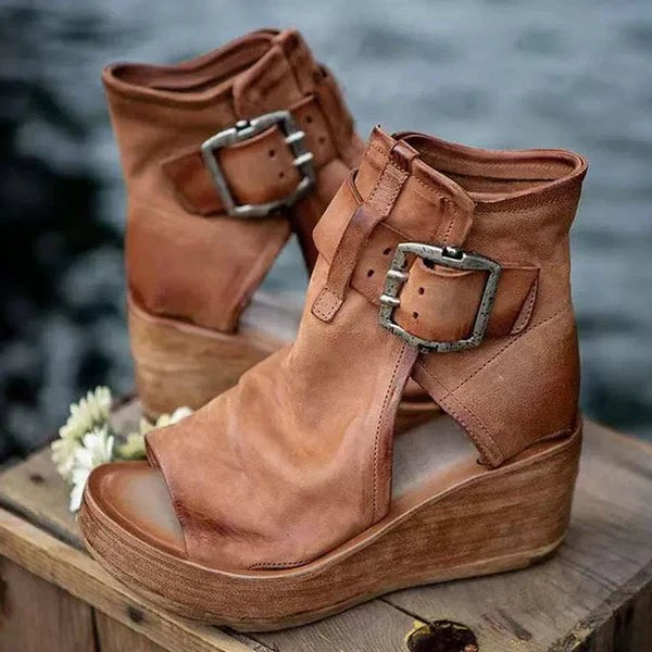 cognac leather wedge booties with open toe and buckle accents