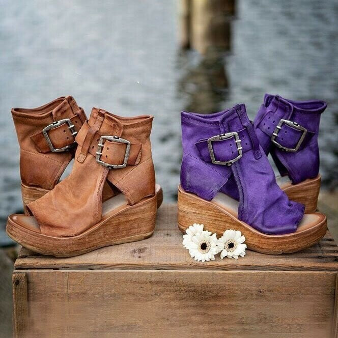 purple and tan leather wedge sandals with buckle straps side by side