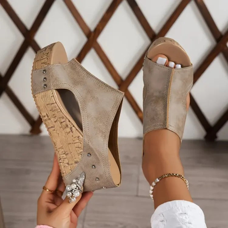 pair of taupe cork platform sandals shown from side and top angle