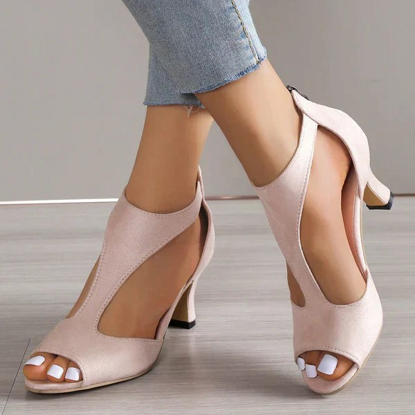 Blush suede peep-toe sandal with T-strap cutout design and low heel