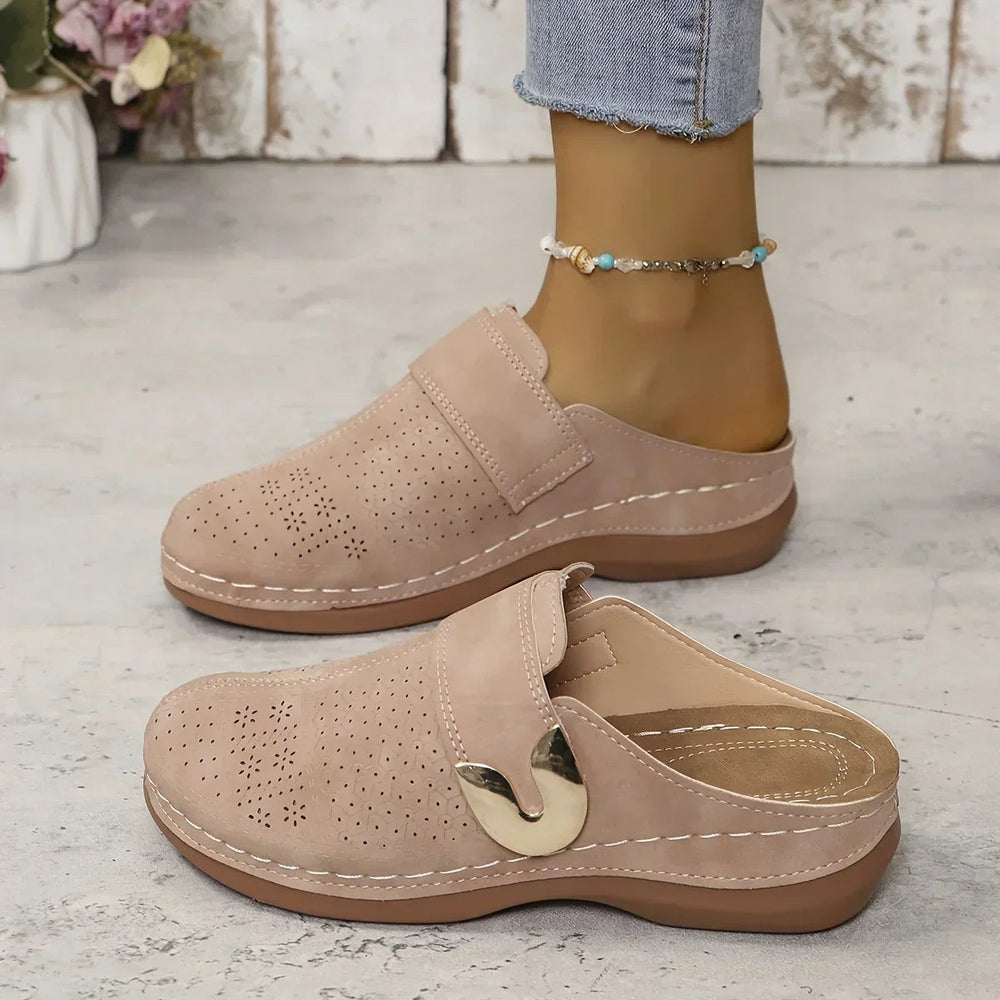 blush pink perforated wedge mule with gold hardware detail