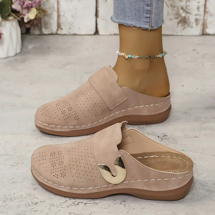 blush pink perforated wedge mule with gold hardware detail